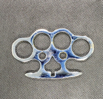 BRASS KNUCKLE DUSTER .