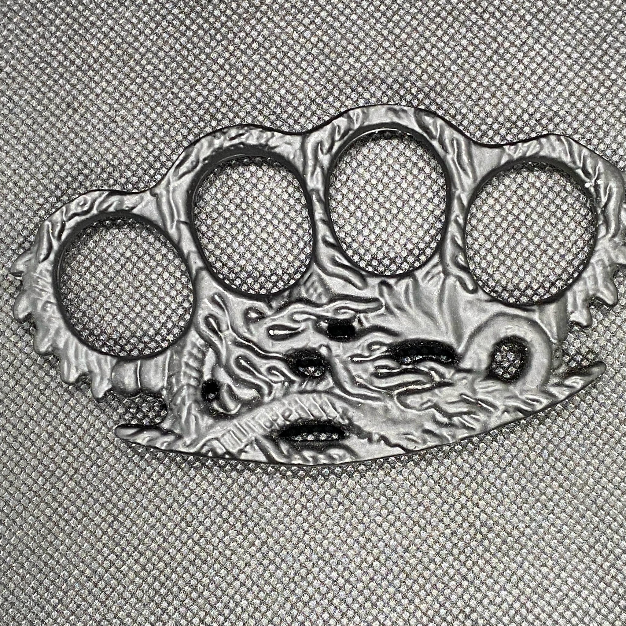 DRAGON GRIPPER HAND PUNCH.
